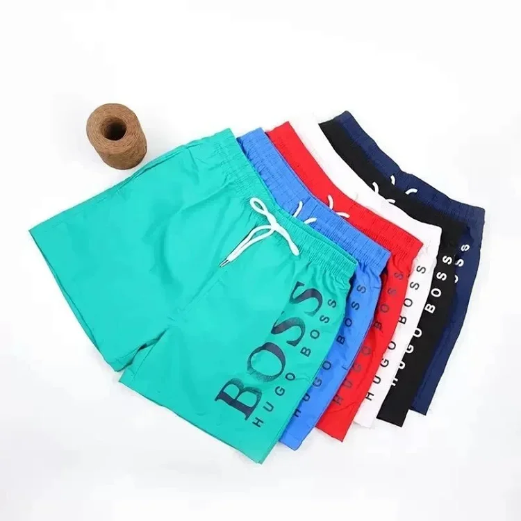 PANTALONES HUGO BOSS · سراويل وشورتات