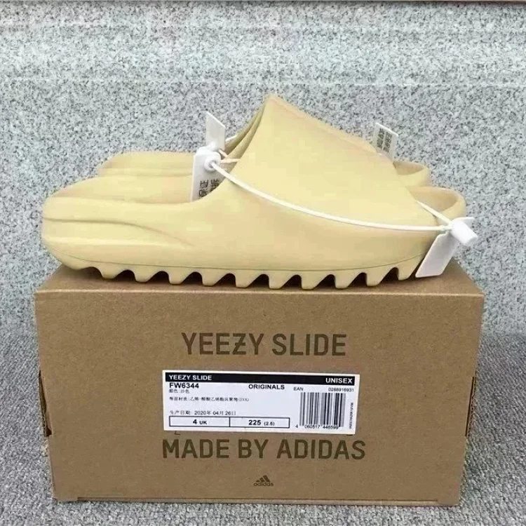Yeezy Slide 7 · Chaussures